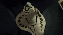 a cartoon character has a stethoscope around his neck