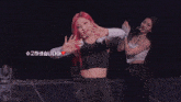 a woman with red hair has a heart on her chest