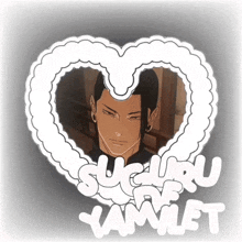 a heart shaped frame with a picture of a man and the words sucuru yamilet