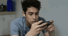 Cellphone Playing GIF - Cellphone Playing Gaming GIFs