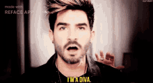 a man with a beard says " i 'm a diva " in front of a white background