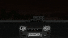 a car that has the letter r on the front of it