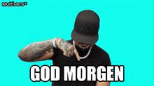 a man is wearing a ny hat and a necklace and says god morgen