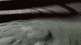 a black and white image with a swirl in the middle of it