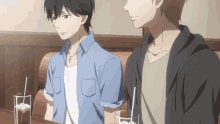 two anime characters are sitting at a table with drinks and straws