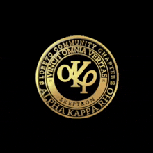 a gold coin that says alpha kappa rho