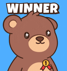 a teddy bear with a medal and the word winner behind it