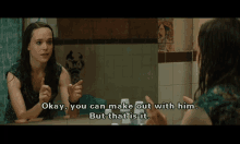 a woman in front of a mirror says okay you can make out with him but that 's it