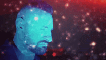 a man with a beard is surrounded by glowing blue lights