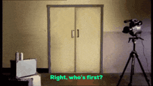 a video camera is in front of a door with the words right who 's first below it