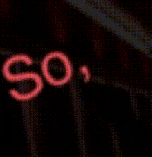 a pixelated image of a person in a red and black outfit