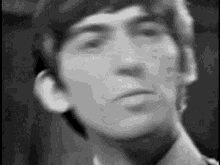 george harrison the beatles smile black and white