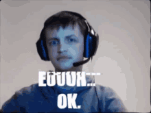 a man wearing headphones and a microphone says " enough ok " .