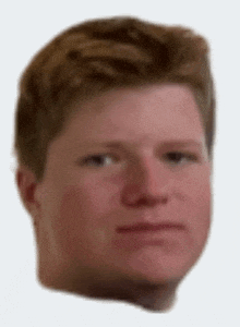a close up of a man 's head with a serious look on his face .