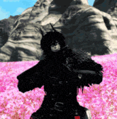 a person in a black coat stands in a field of pink flowers