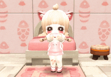 a girl with a lollipop in her mouth sitting on a chair