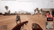 a man playing a video game with 64 joined on the screen