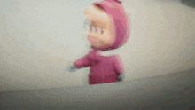 a blurred image of a cartoon character in a pink jacket