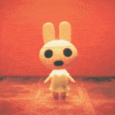 a stuffed bunny with big eyes and a surprised look on her face