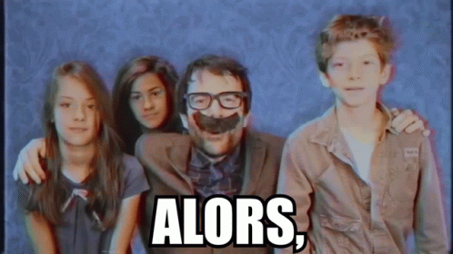 a man with glasses and a fake mustache is surrounded by two girls and a boy with the word alors on the bottom