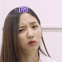 a woman has a question mark on her head