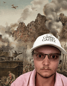 a man wearing glasses and a hat that says grand gabriel