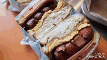 a close up of a sandwich with the words made in animotica at the bottom
