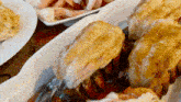 a close up of a plate of food on a table with shrimp .