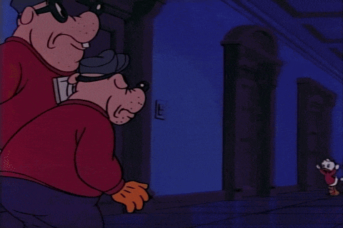 The nephews flee down a corridor and the Beagle Boys chase them