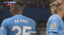 a soccer player with the number 25 on his shirt