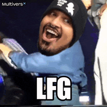 a man with a beard wearing a black beanie is smiling and says lfg in white letters