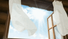 an open window with white curtains blowing in the wind and the sun shining through