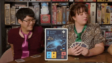 two people are playing a game called ancient ruins