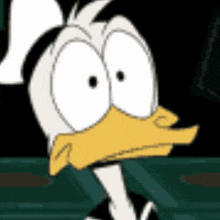 a close up of a cartoon duck with a surprised look on its face .