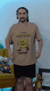 a man wearing headphones and a matsu sando shirt