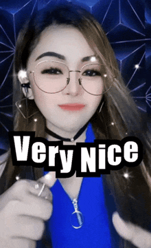 a woman wearing glasses giving a thumbs up and the words very nice behind her