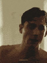 a close up of a man 's face with crialianova below it