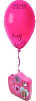 a pink balloon that says made in china is hanging from a pink barbie camera