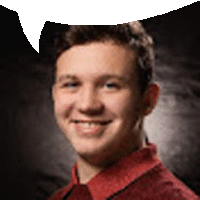 a young man in a red shirt with a speech bubble behind him