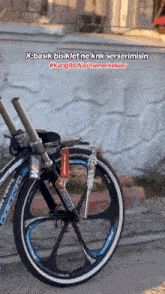 a bicycle with a sticker on the front that says ' bmw '