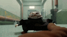 a cartoon character is being kicked in the face by a person .