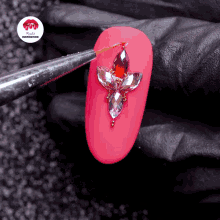 a close up of a nail with rhinestones and the words nails inspiration at the top
