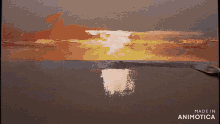 a painting is being painted with a spoon and the words made in animotica are visible