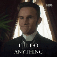 a man in a suit says i 'll do anything in front of a hbo logo
