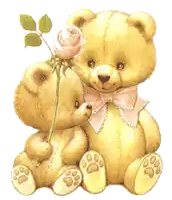 two teddy bears sitting next to each other one of them holding a rose