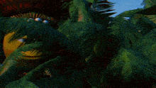a cartoon character sits in the grass with a laptop