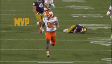 a football player with the number 9 on his jersey is running with the ball