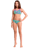 a young girl wearing a bikini with a pink top and green bottoms