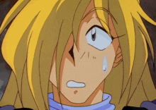 a close up of a cartoon character 's face with a tear coming out of his eye