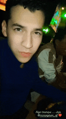 a close up of a man 's face with the words algo tranqui